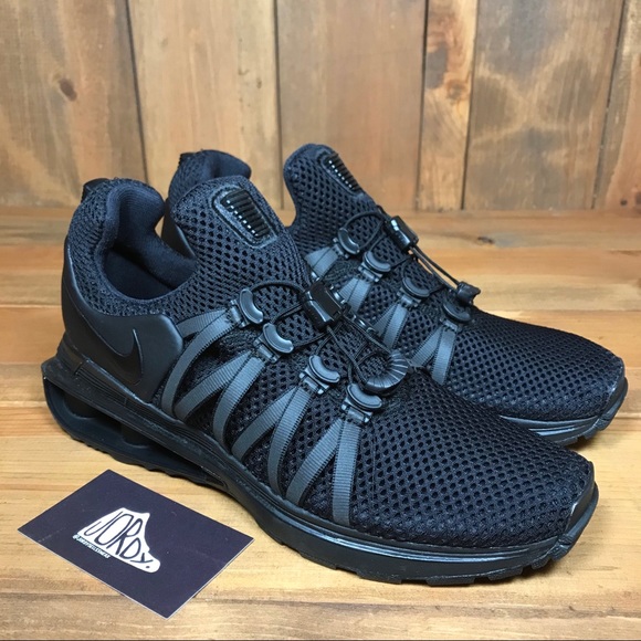 nike shox gravity triple black